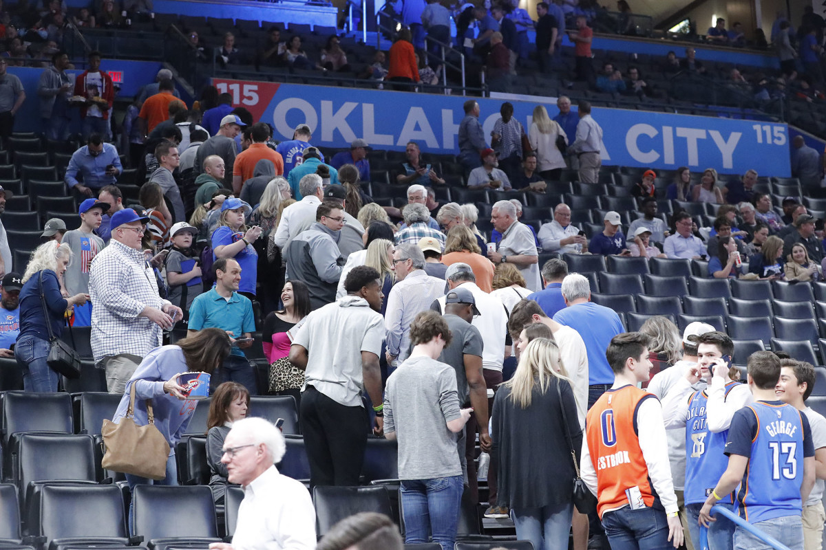 Fans leave after being told the Oklahoma City Thunder vs. Utah Jazz  game had been cancelled just before tip off.